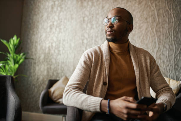Portrait of black african creative looking into distance