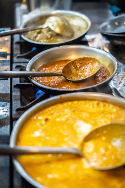 istock Cooking traditional Indian curry 1296159526