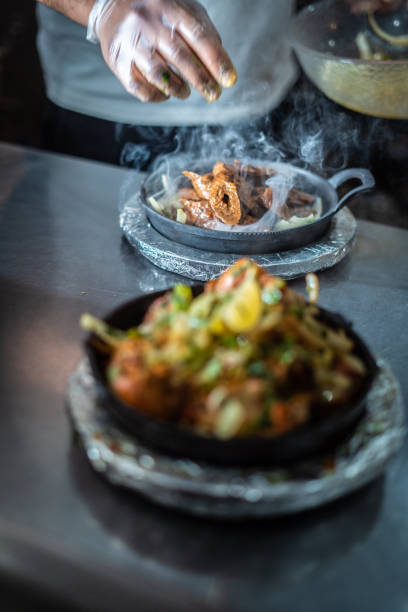 istock Indian kebab platter in hot sizzling plate 1296160891