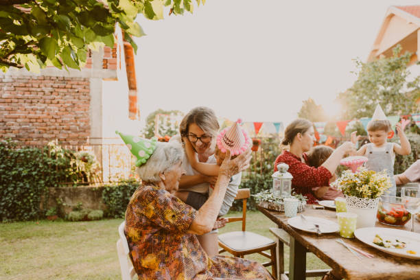 istock Great grandma's birthday party 1296162488