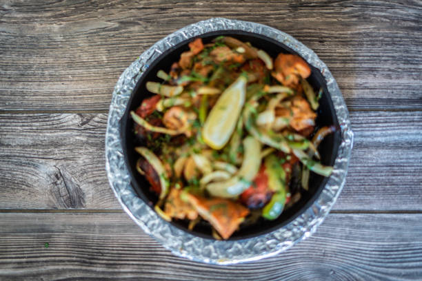 istock Kebab platter in hot sizzling plate 1296164564