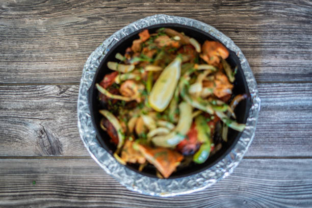 istock Kebab platter in hot sizzling plate 1296164581
