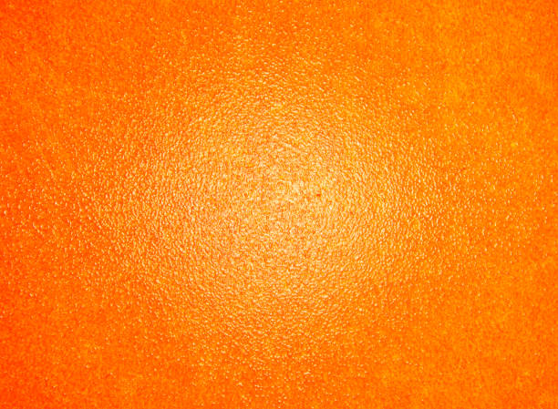 オレンジ色のリンドは白いペンキでテクスチャ/背景を塗った - bright skin ストックフォトと画像