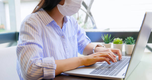 istock businesswoman work in coffee shop 1296174080