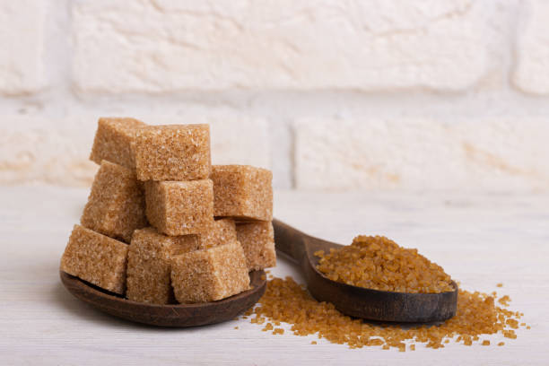 istock Throsy sugar in wooden spoons 1296175742