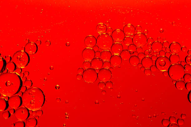 istock Oil and water drops background 1296178399