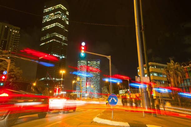 istock Tel Aviv At Night, Skyscraper Construction Sites and traffic In Tel aviv 1296179365