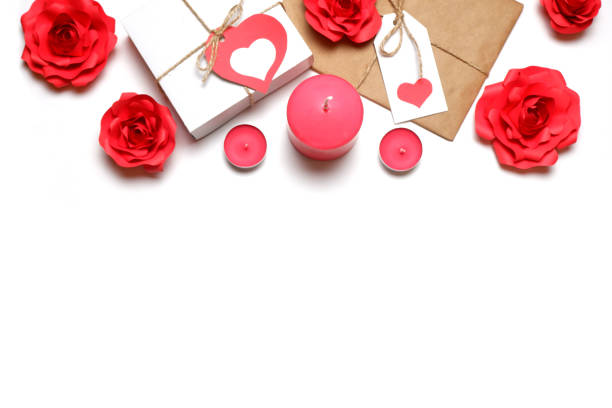 istock Love, Valentine's, women's day, relations, romantic template from white gift box and gift wrapped in craft paper, tied with twine with bows and labels with red hearts, roses, candles white background 1296179831