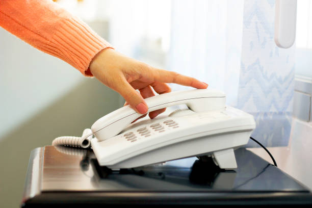 istock Close up on female hand holding phone . 1296181331