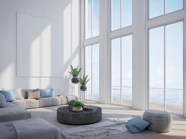 soggiorno moderno in casa di lusso con vista sul mare e tela bianca.3d rendering - seaview foto e immagini stock