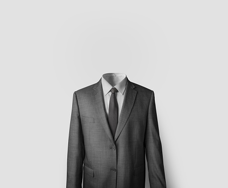 Waist up photo of headless body in dark suit with light grey shirt and black tie. Invisible businessman isolated on white background.