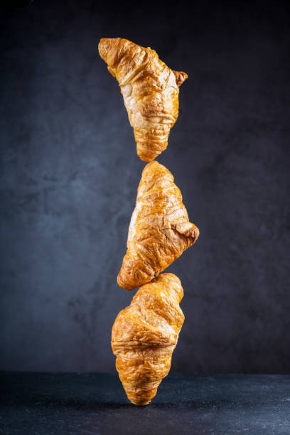 istock Delicious snack croissant on black 1296185381