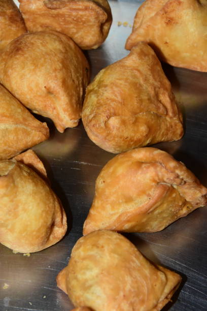 istock Indian delicious hot hot samosa view 1296186112