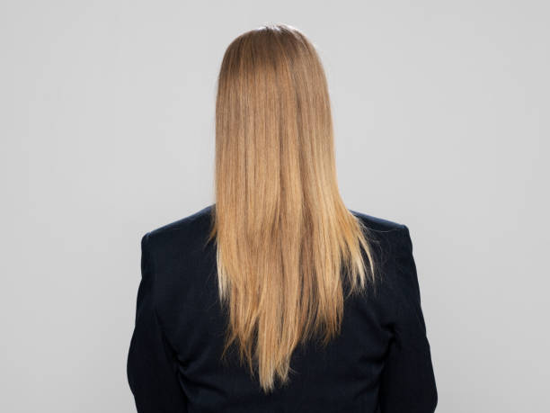 istock Rear view of mature woman 1296186380
