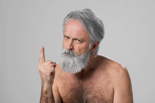 istock Close-up of angry mature man 1296186447