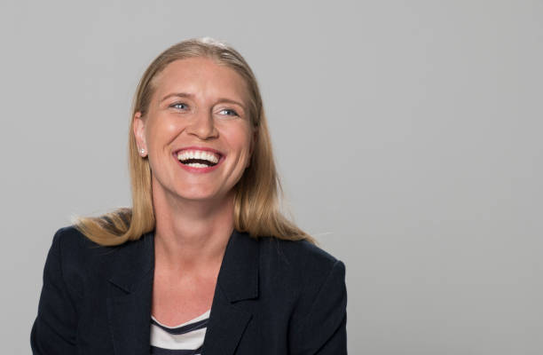 istock Laughing mature woman 1296186526