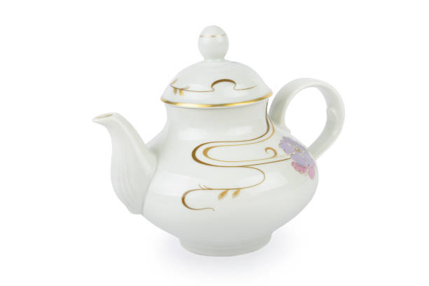 istock Ceramic teapot with ornament in classic style isolated on white background. Retro tea pot. 1296189038