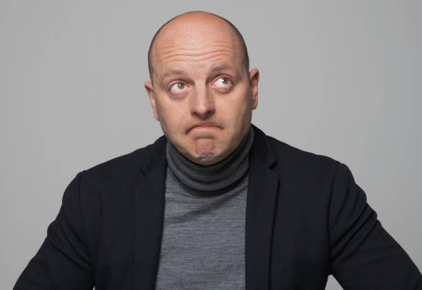 istock Portrait of mature man 1296193884