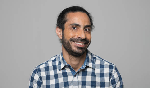 istock Portrait of smiling man 1296194163