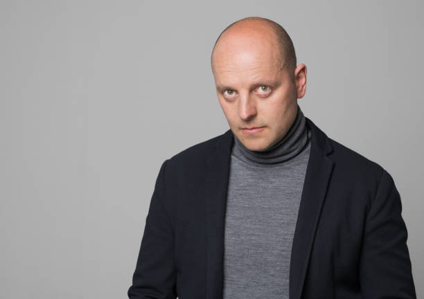 istock Portrait of serious mature man 1296194336