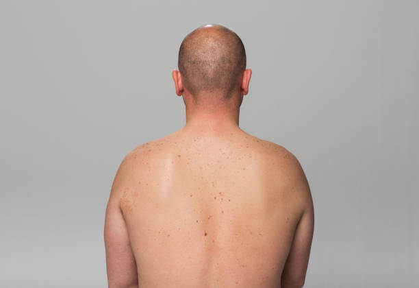 istock Rear view of mature man 1296194934