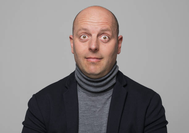 istock Portrait of surprised mature man 1296195532