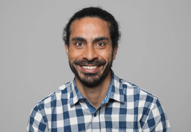 istock Portrait of smiling man 1296195585