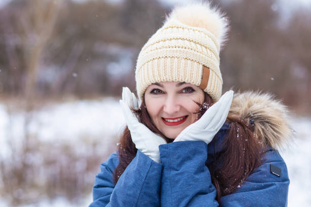 istock Woman in a hat smiling . 1296195617
