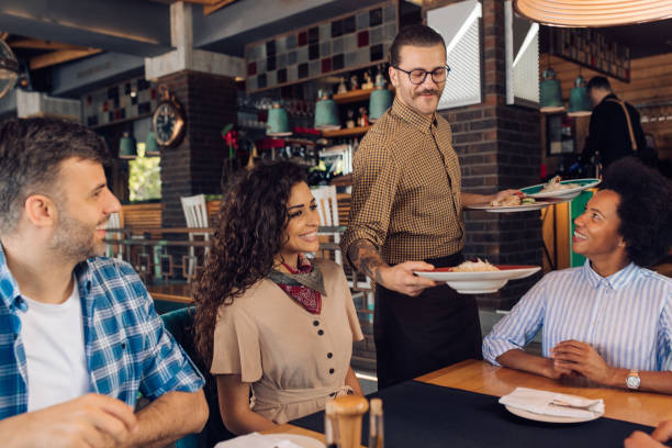 istock Group of colleagues getting their order at the restaurant 1296195722