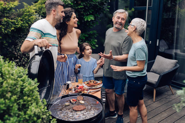istock Family enjoying their barbecue gathering 1296196429