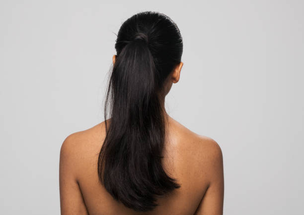 istock Rear view of young woman 1296197161