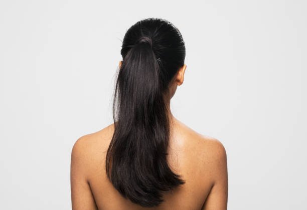 istock Rear view of young woman 1296197163