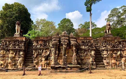 Angkor, Cambodia - January 24, 2020: Sculpture depicting Airavata three-headed elephant at the Elephant Terrace of Angkor Thom. Angkor Thom (Great City) was the last and most enduring capital city of the Khmer Empire. It was established in the late twelfth century by King Jayavarman VII.