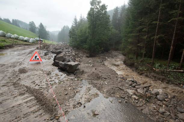 istock road flooding after heavy rainfall 1296198608