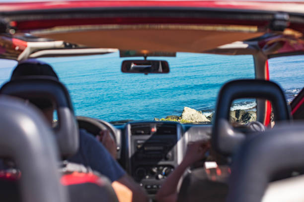 istock Road trip. Father and son travelling together by car 1296199637