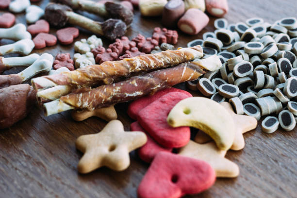 istock Dog tasty colored biscuits, snacks for dogs 1296201500