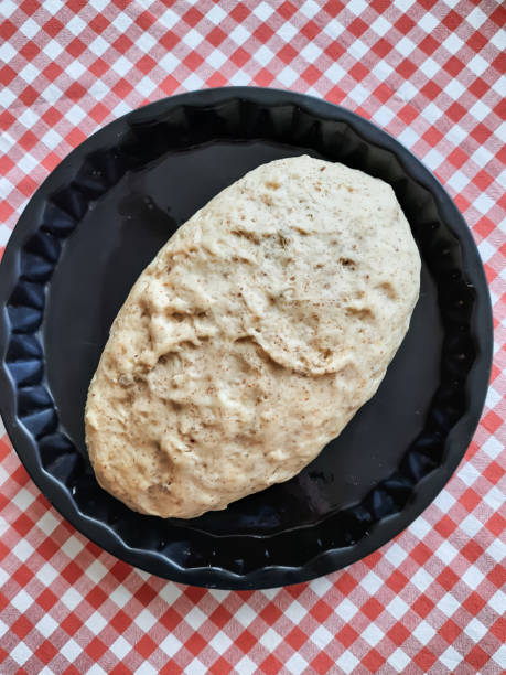 istock Bread, homemade cakes. Fresh bread on a tablecloth on the table. Food and drinks. 1296201555