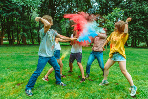 istock young happy friends at holi fest 1296202470