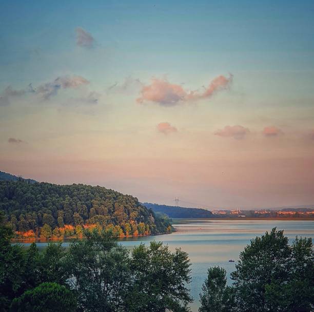 istock Landscape lake and forest sunset 1296207434