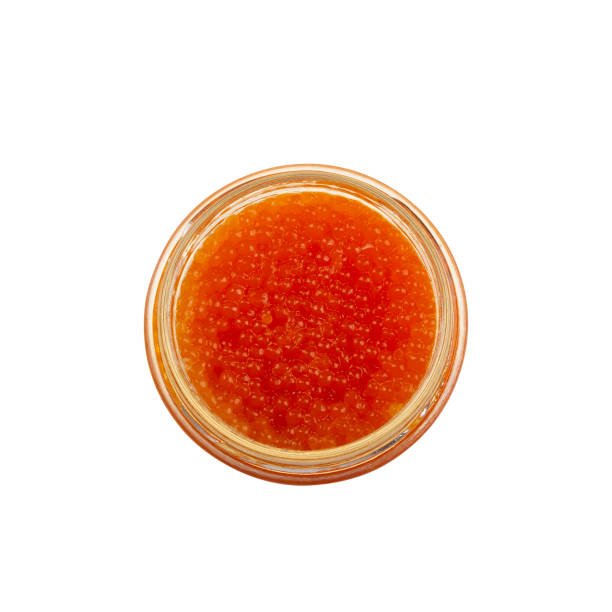 istock Red caviar in a glass jar isolated on white background with clipping path 1296212809