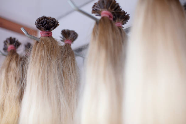 istock Posthetic hair waiting for customers. 1296215574