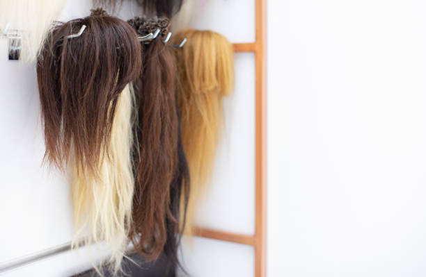 istock Posthetic hair waiting for customers. 1296215653