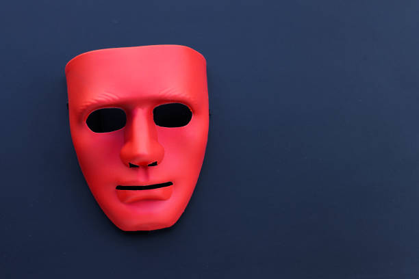 istock Red mask on the dark background. 1296217661