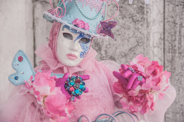 Venice, Italy - February 3, 2013: One beautiful masked Lady at Venice Carnival 2013