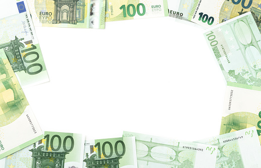 Hundred euro bills over white background with copy space.