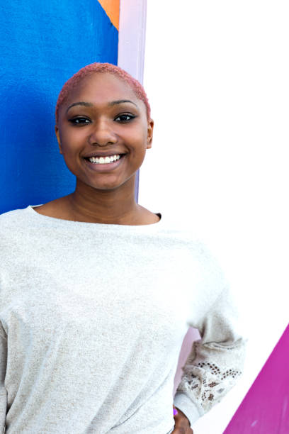 istock Confident and unique African American young woman smiling 1296219089