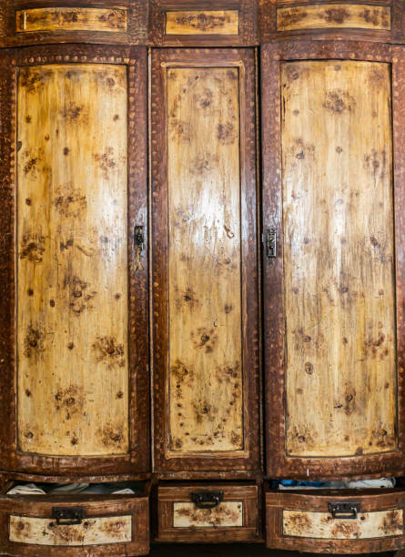 istock Antique Soviet wooden wardrobe with three doors and drawers 1296221690