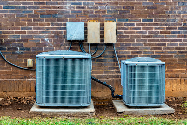 istock Air Conditioning Units Outside Small Office Building 1296222538