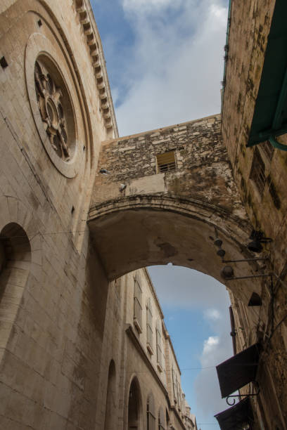 istock narrow empty street in old Jerusalem, Israel 1296226919