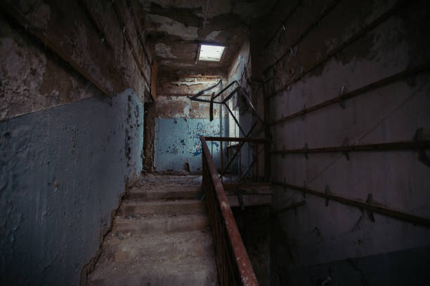 istock Dark creepy rotten abandoned building 1296227962